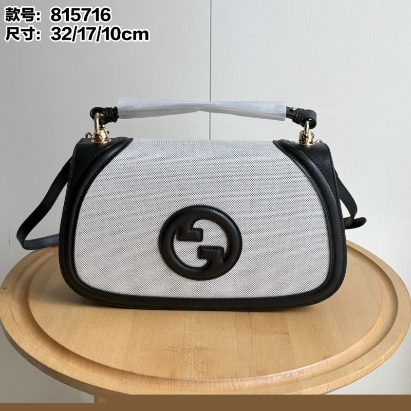 G*u*i satchel bags